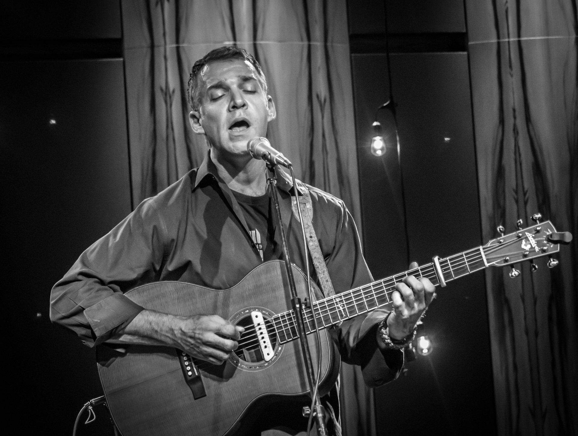 Black and white portrait mid-song